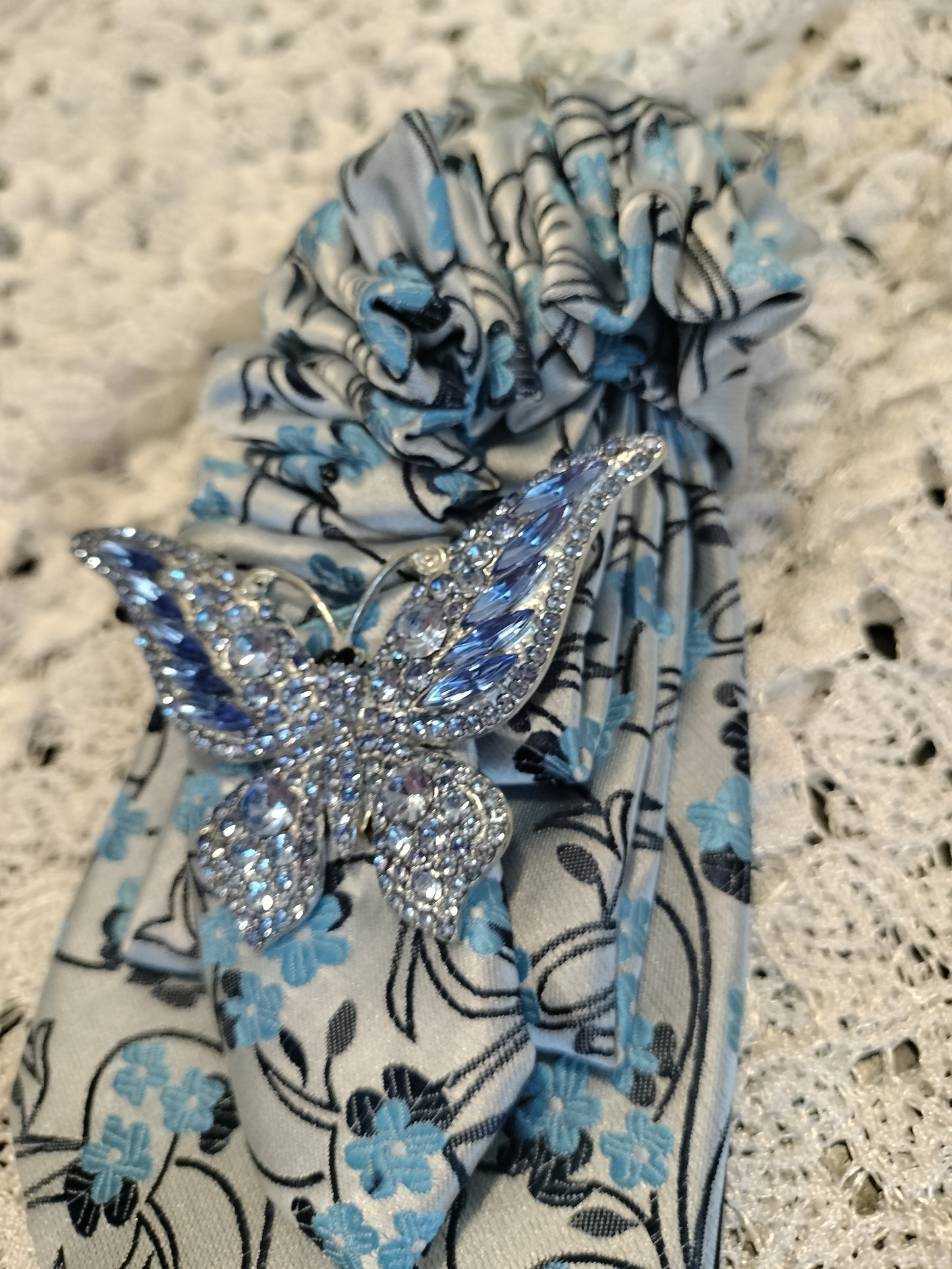 Elegant Blue Floral Tie with Rhinestone Butterfly Brooch