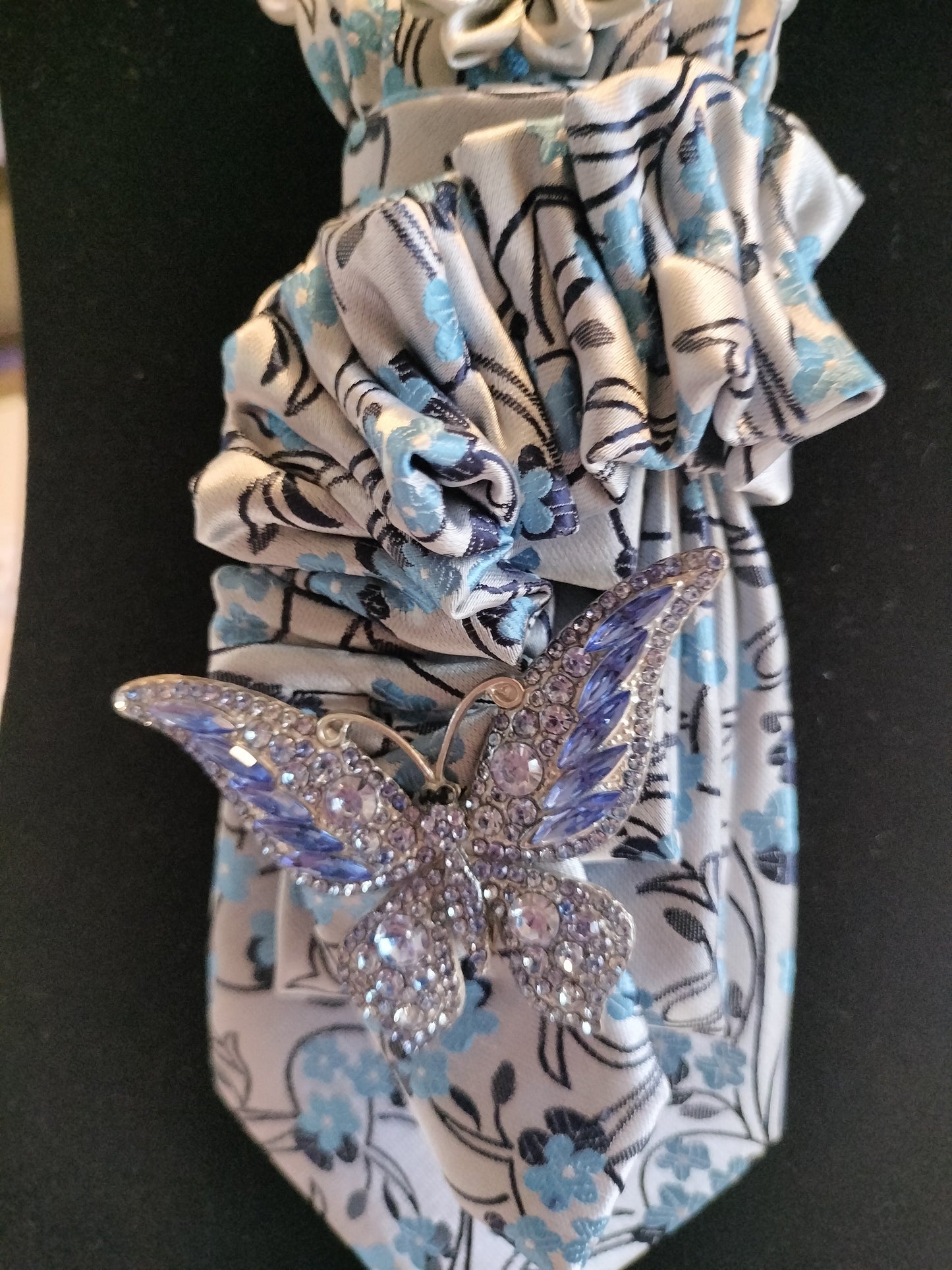 Elegant Blue Floral Tie with Rhinestone Butterfly Brooch
