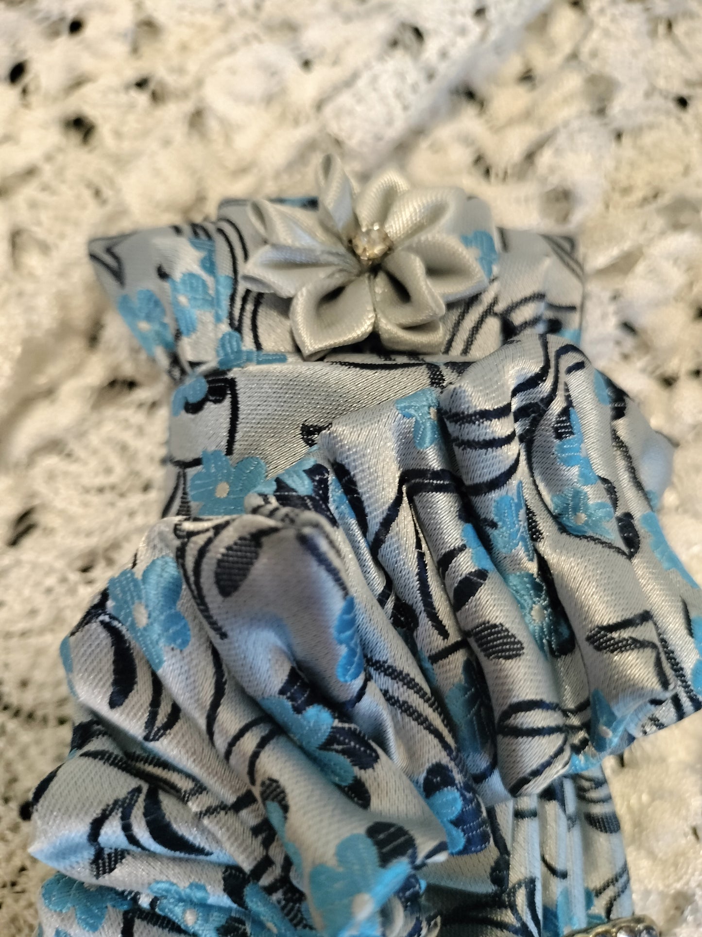 Elegant Blue Floral Tie with Rhinestone Butterfly Brooch